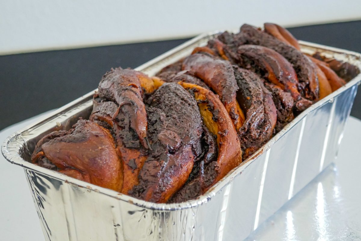 Sliced chocolate babka showing rich swirled layers